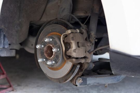 Disc brake of vehicle transport. Car maintenance and auto service garage concept