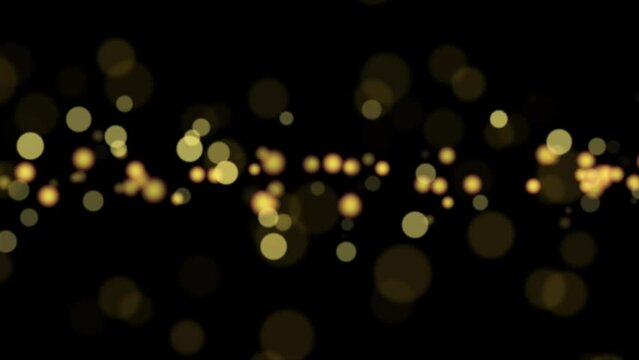 Bokeh and glittering background with golden colors. Magic of Golden Bokeh, Shimmering Glittering Particles. Seamless 4K video