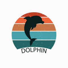 Dolphin jumps on sunset background