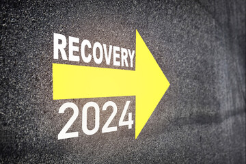 Recovery 2024 with yellow arrow marking on road. Business challenge with success concept and motivation wealth idea