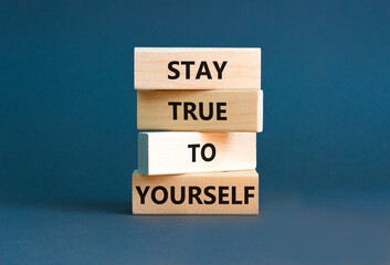 Stay true to yourself symbol. Concept word Stay true to yourself on beautiful wooden block. Beautiful grey table grey background. Business stay true to yourself concept. Copy space.