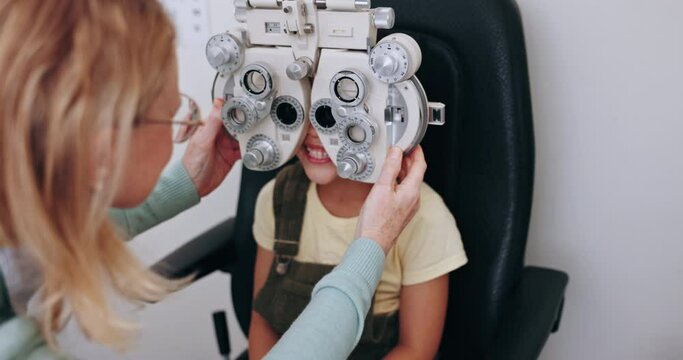 Eye exam, optometry and optician with child on phoropter for testing vision, sight and machine for eyes. Healthcare, medical equipment and young patient with woman for ophthalmology scan in clinic