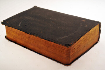 Jewish Bible. Selective focus. Old used Jewish books. Open writing pages. Closing