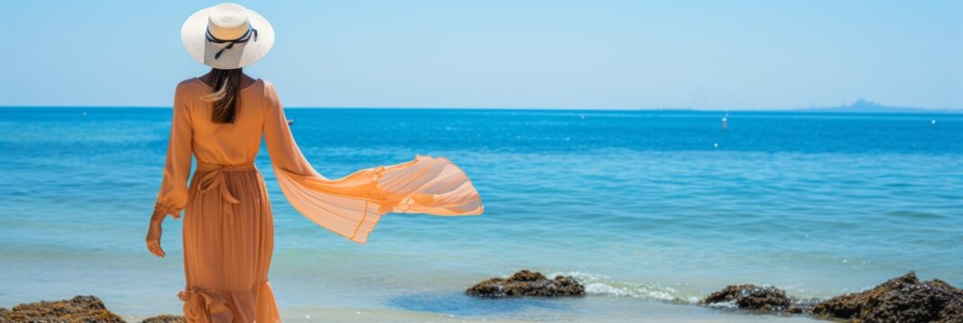 Unidentified woman finding pure joy and relaxation in a sun drenched beach vacation getaway