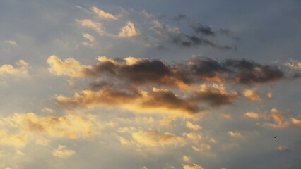 Sunset sky with orange clouds