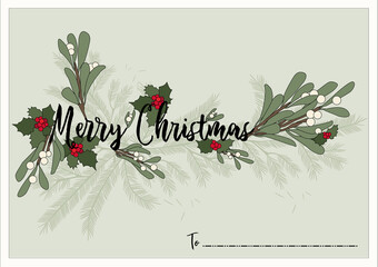 Une &eacute;tiquette cadeau pour No&euml;l avec du houx, du gui et des branches de sapin.