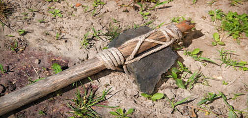 Stone ax of a primitive man