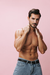 Fototapeta premium Man background belt naked sport body muscular sexy torso muscle pink fitness lifestyle