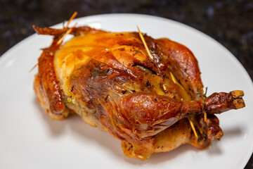 Traditional homemade roast chicken, stuffed with farofa