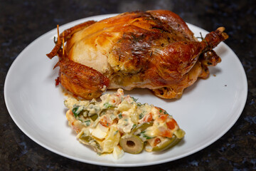 Traditional homemade roast chicken, stuffed with farofa