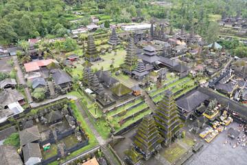 Fototapeta premium Birds eye view of Pura Agung Besakih hindu temple on cloudy day. Bali, Indonesia.