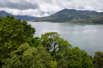 Aerial view of Buyan Lake on cloudy day. Bali, Indonesia.