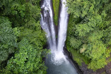 Fotobehang Aerial view of Aling Aling waterfall. Bali, Indonesia. © Kirill