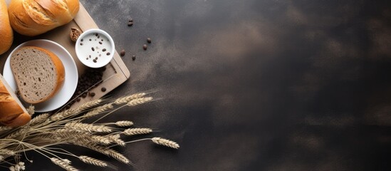 The background of the photo has a textured surface resembling grains with an isolated space ideal for capturing the beauty of food and coffee The contrasting white and black colors enhance t