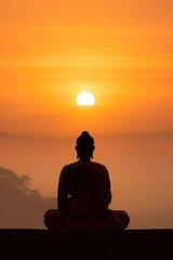 Buddha statue and sunset in the morning
