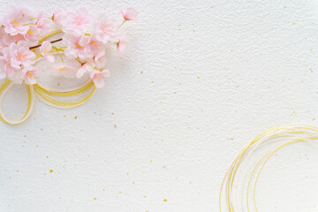 白い和紙に桜と金の水引のフレーム