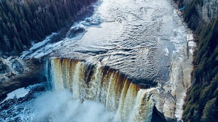 Aerial drone view of Alexandria falls near Hay river, Northwest Territories, Canada. - Powered by Adobe