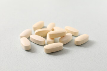 Fototapeta na wymiar pills on a white