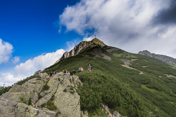 Entrance to Giewont, a queue of people on the trail to Giewont