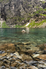 Morskie oko pond, view of the water surface and rocks