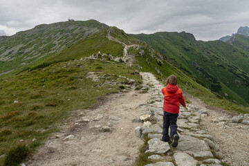 young tourist on a mountain trail in the Tatra Mountains