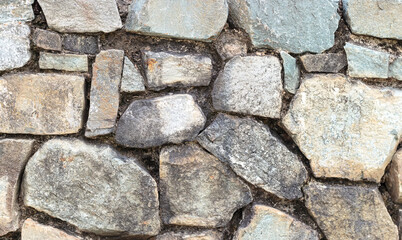 Close-up of a beautifully textured dry stone wall.