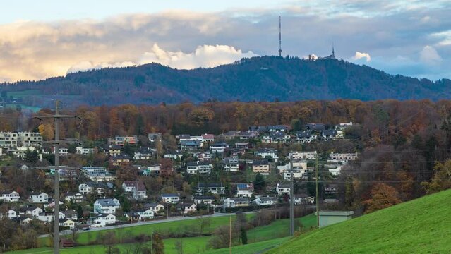 Time lapse, town in the mountains. View on the Uetliberg tower. Birmensdorf, canton of Zürich in Switzerland.