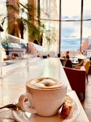 Melange and cantuccini enjoyed in the famous Haas Haus in vienna with a view on the Stephansdom.