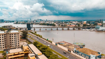 Fototapeta premium Aerial view of Faloko bridge connecting the coasts of Lagos city