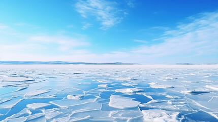 Blue ice and cracks on the surface of the ice. Frozen lake under a blue sky in the winter. - obrazy, fototapety, plakaty