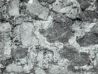 Stones, Rock texture. Abstract rock texture. Rock wall face with a grunge effect, light colored stone with a sandstone texture. This makes a good natural texture background for many applications