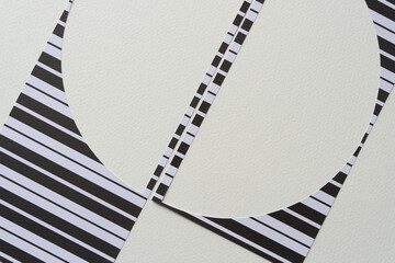 divided circle frame composed of machine-cut paper stencils on blank paper