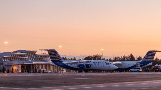 Bishkek, Kyrgyzstan - September 26, 2023: Manas 2 International Airport building with airplanes