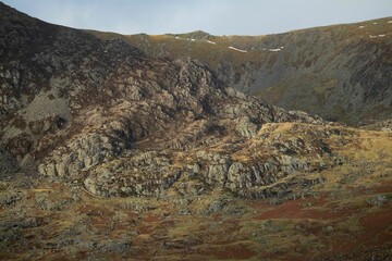 Snowdonia landscape of rocky hills valley in Wales under a blue sky