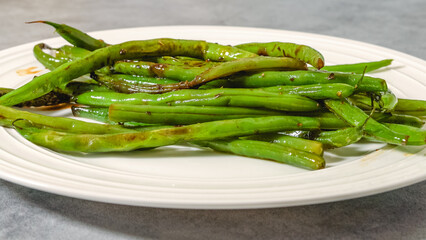 Pan fried French green beans (Haricots Verts) recipe. String beans close-up