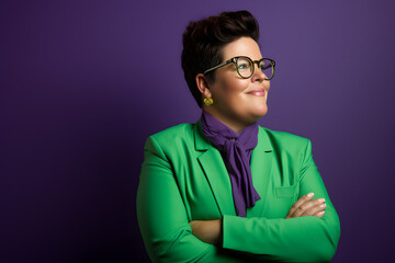 Fototapeta premium Slightly overweight businesswoman smiling confidently. Bold and vibrant clean minimalist studio portrait, copy space.