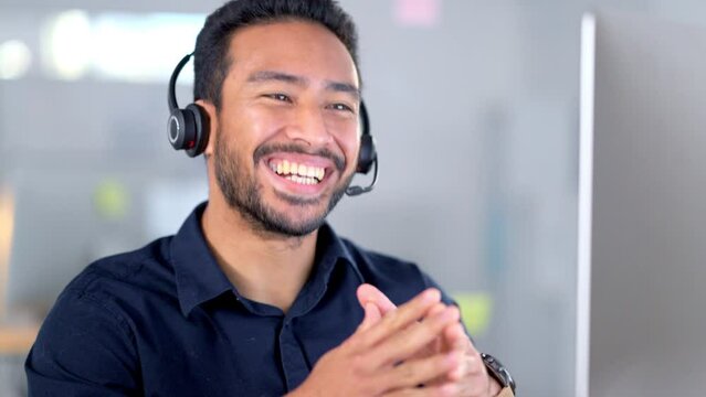 Call center agent talking on headset while working in an office. Confident and happy salesman explaining and selling products while operating a helpdesk for customer sales and service support