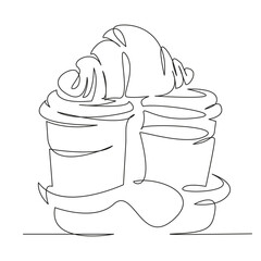 two coffees with a croissant