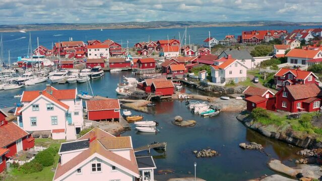 Flight over idyllic fishing village in Sweden. Summer life west coast, K&auml;ring&ouml;