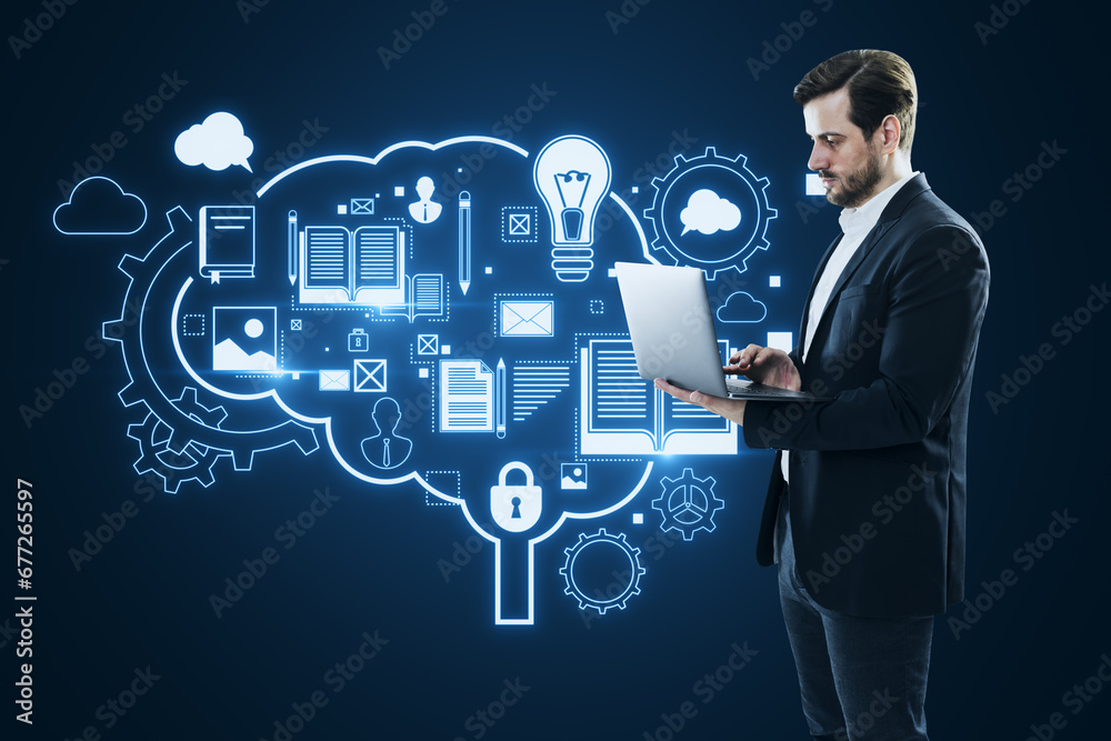 Poster attractive young european businessman using laptop with glowing brain outline and books hologram on 