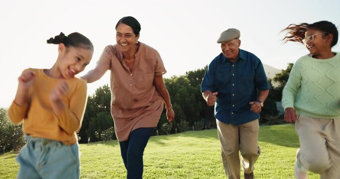 Grandparents, children and running outdoor at a park with energy and game for bonding in nature. Race, chase and love with senior man, woman and kids on grass in summer for fun family adventure