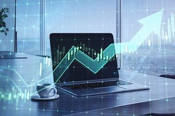 Laptop displaying stock market analysis over cityscape background