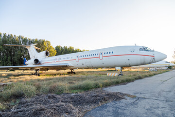Fototapeta na wymiar Disassembled plane in the aircraft graveyard