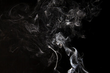 White Smoke Cigarette in Dark Background