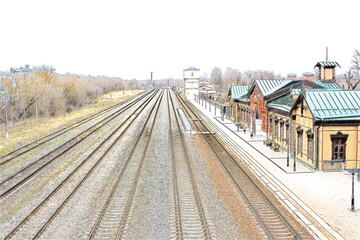Obraz premium Top view of the railway tracks near the station.