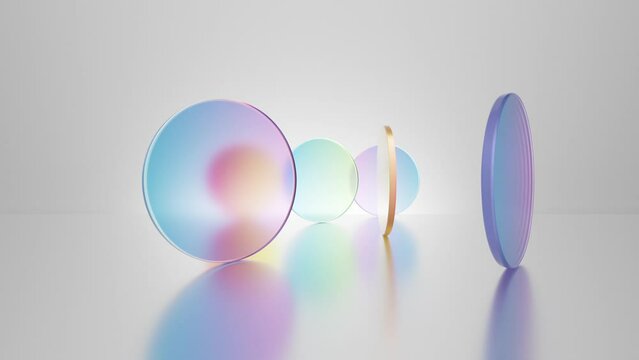 Multicolored translucent round glass blocks spin and rotate on a white background. 3d cycled animation