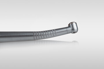dental turbine handpiece for caries treatment isolated on white background