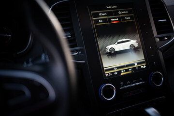 Close-up of the large LCD monitor of the car's modern radio