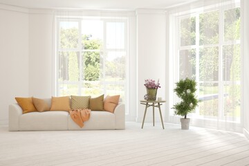 Modern interior concept with sofa and summer landscape in window. 3D illustration