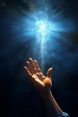 Foto op Plexiglas hand of the person reaching the magic bright lights in a dark blue space © Tamara